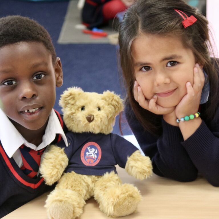 children with a teddy