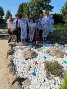 Year 6 planting the pebbles