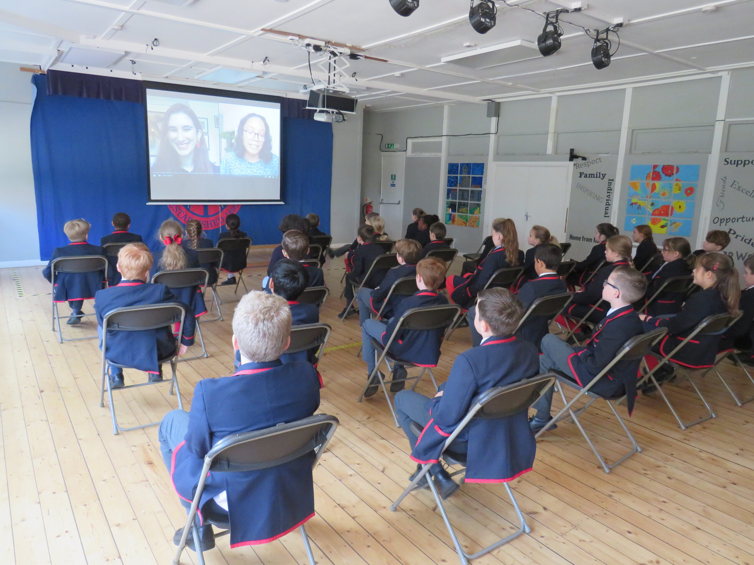 Year 5 & Year 6 listening attentively to Katherine Rundell